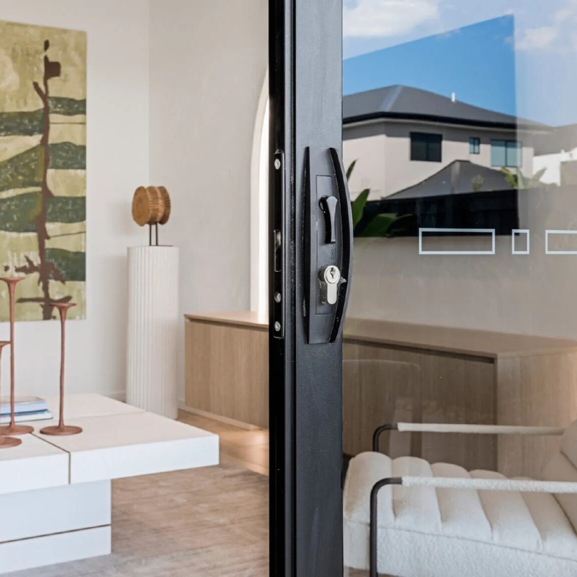 Sliding door lock and handle